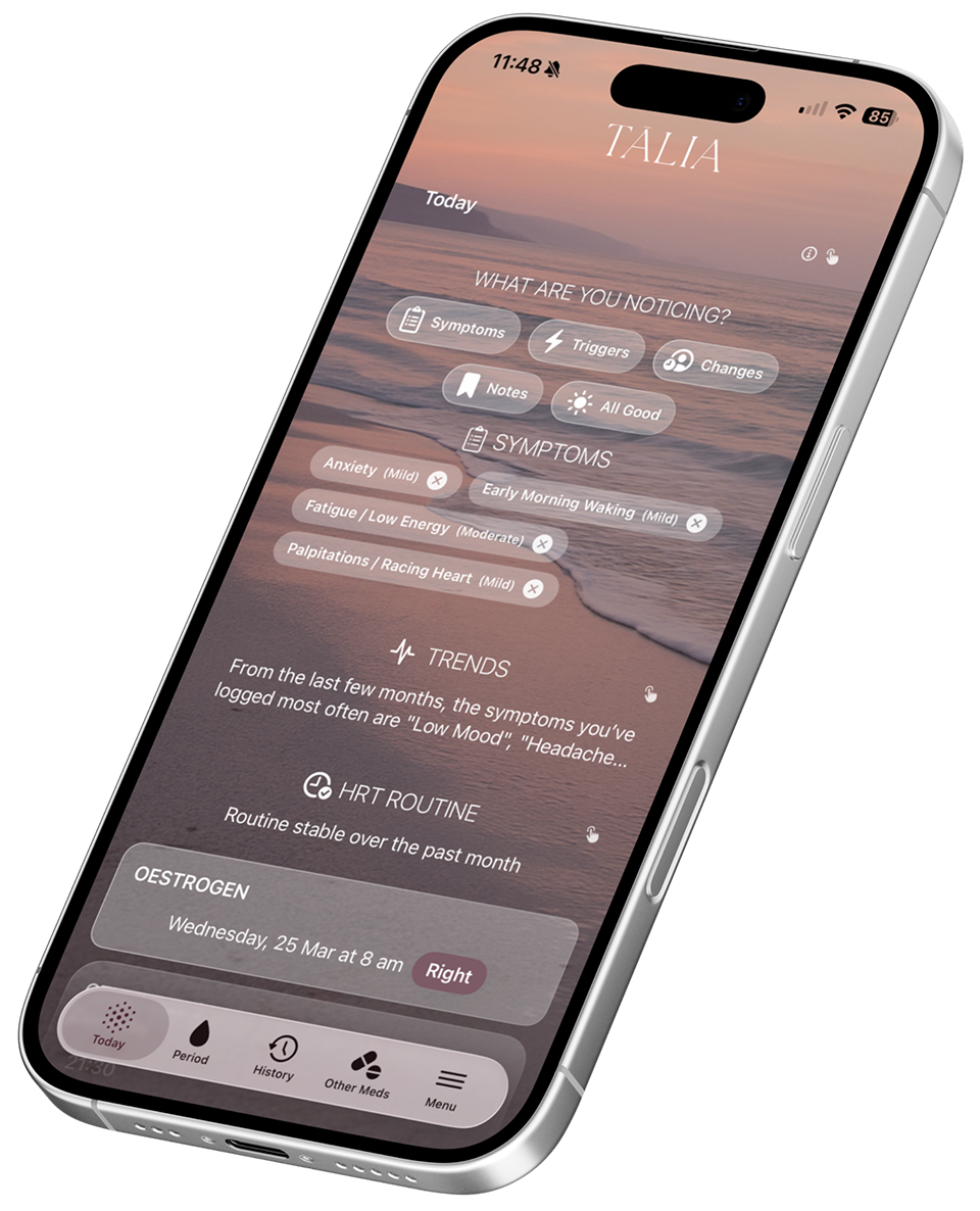 Angled iPhone displaying the TĀLIA app interface over a soft beach background, showing perimenopause symptom tracker options, recent symptoms, trends, and HRT routine details in a calm, minimal design.